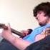 Cameron Playing Guitar