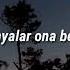 KÜRŞAT GÜREL BİR GÜLÜŞÜ VAR LYRİCS