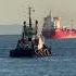 Tug Boat VB SIMUN Headed Out From Cepsa Refinery To Pull In A Crude Oil Tanker